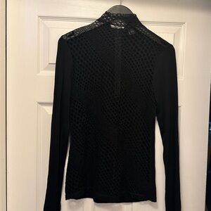 Black long sleeve fitted top with mesh on the back